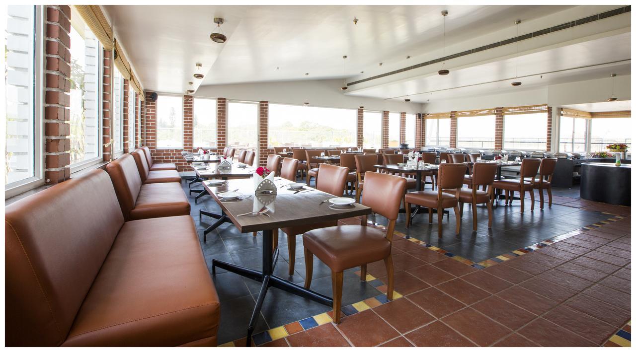 Tulip Inn Bangalore Bagian luar foto